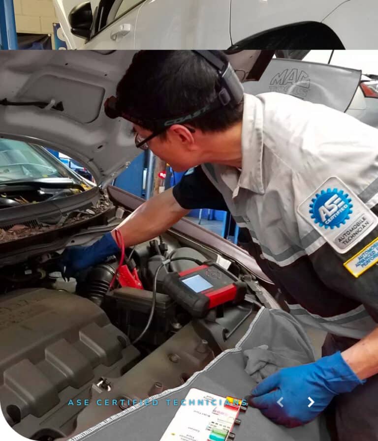 GIC Car Clinic Master Technician diagnosing a car