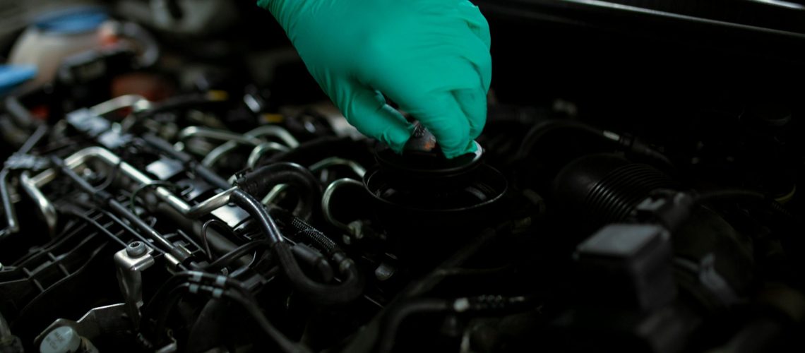 Opening Oil Filler Cap of a Car Engine 11