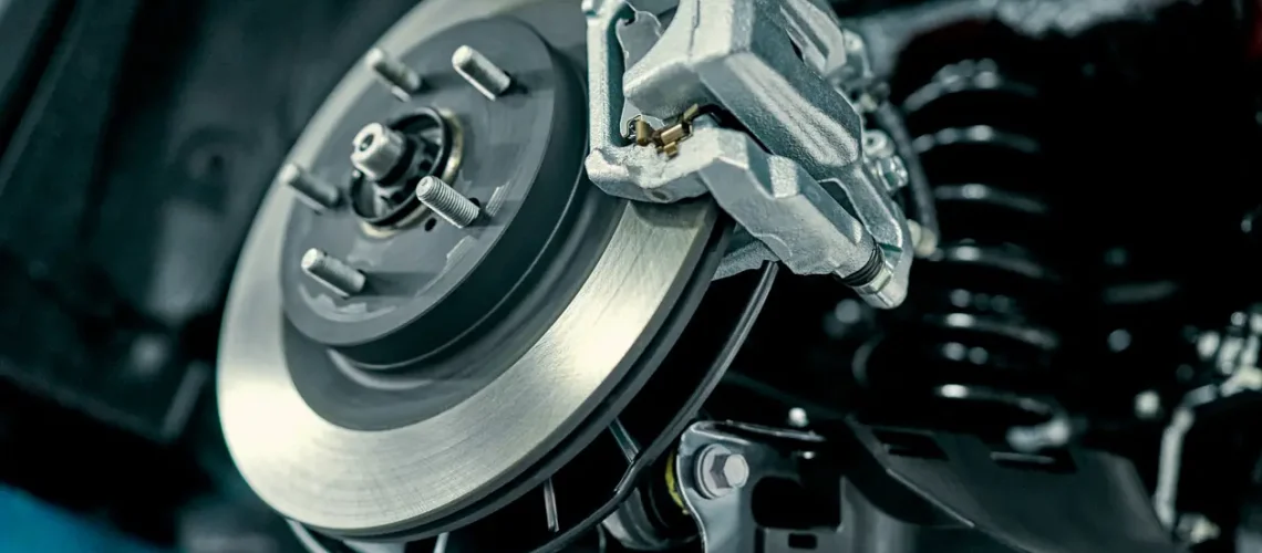 disc-brake-and-pads-on-a-vehicle.jpg