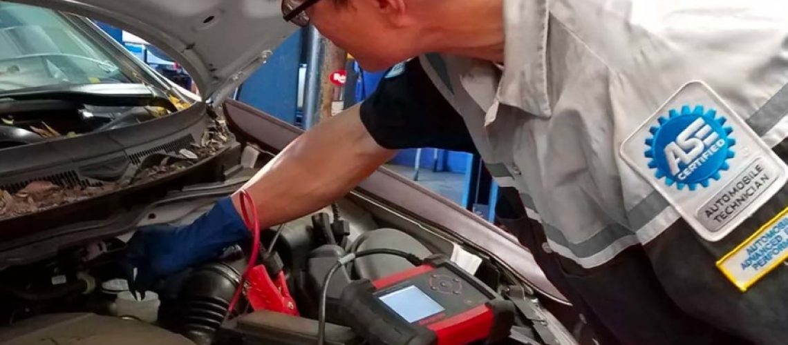 GIC Car Clinic Master Technician diagnosing a car